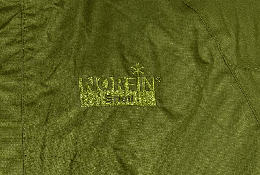 Фирменный логотип костюма Norfin Shell